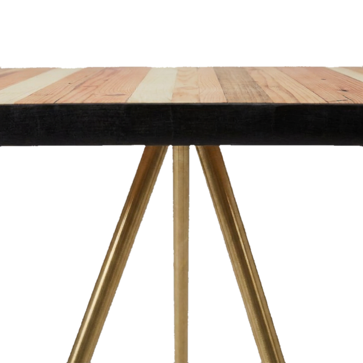 Close-up of three solid brass legs meeting the underside of the wooden top