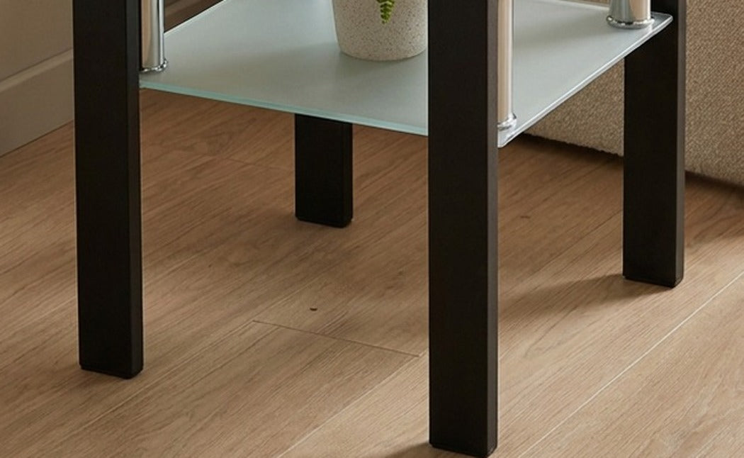 Square tempered glass tea table, leg and floor close-up