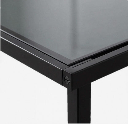 Close-up of the tempered glass tabletop and frame edge