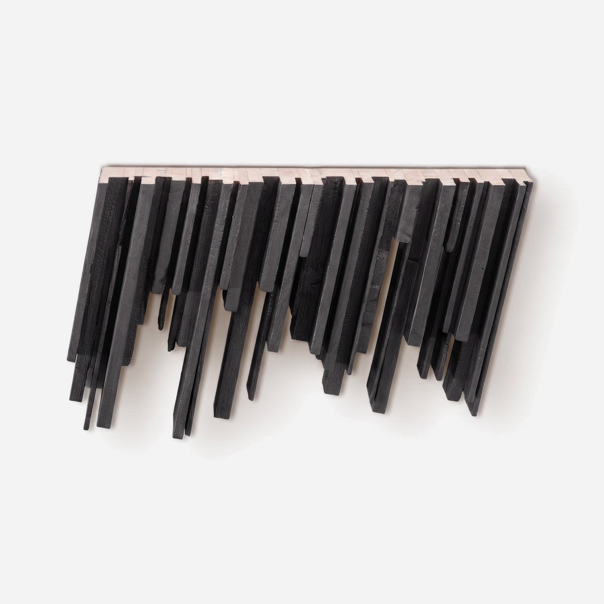 Torched wood floating shelf with black slats and a natural tung oil top, front view