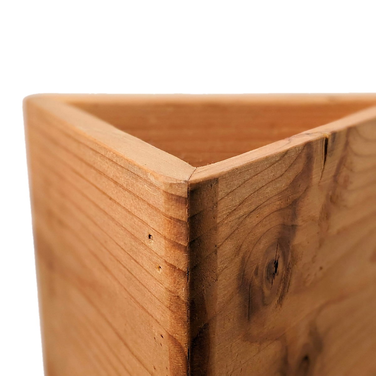 Natural tung oil corner with a knot on the triangle wall planter (close-up detail)