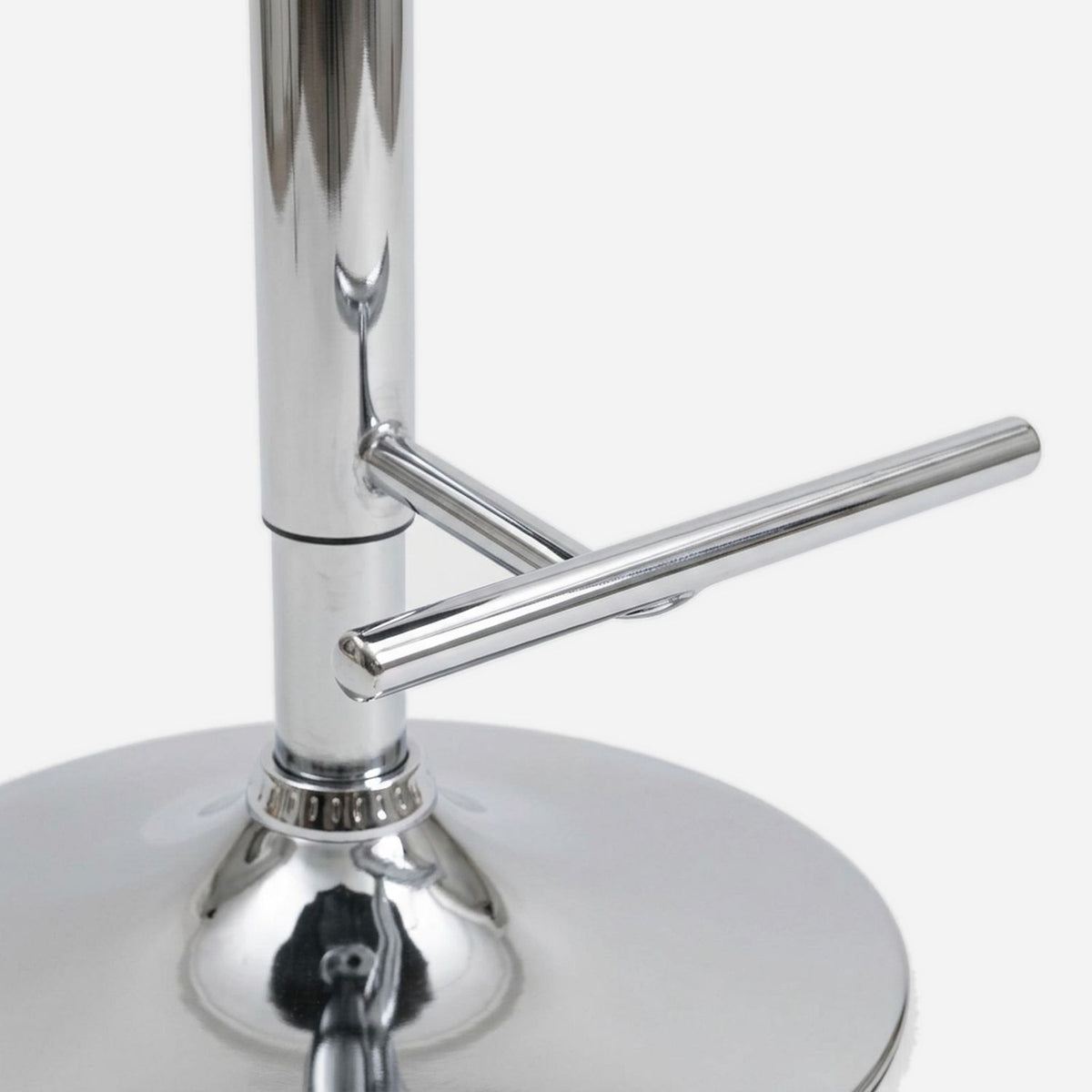 Chrome footrest bar, column and round disc base, close up