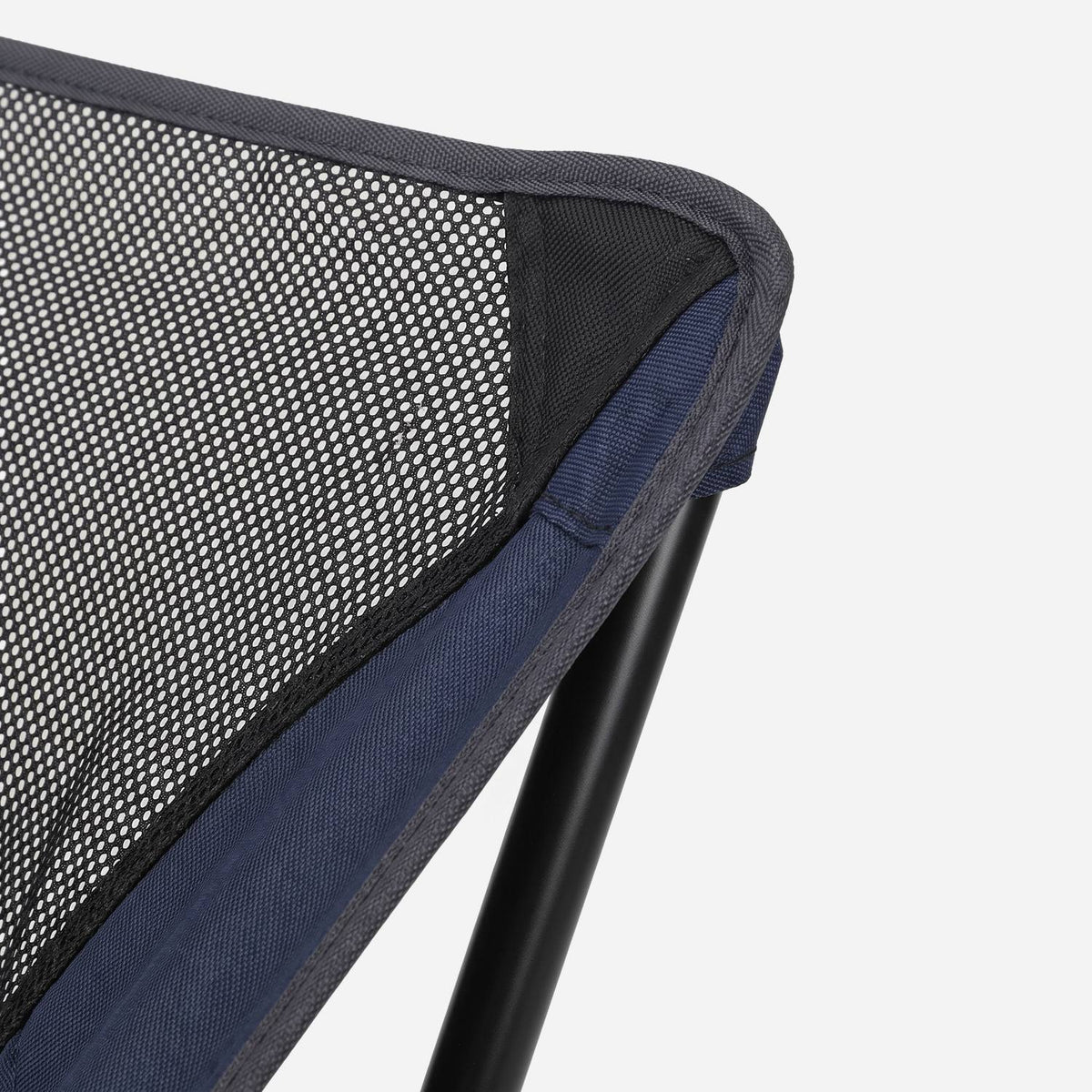 Navy Oxford fabric, charcoal binding and open mesh at the back corner (close-up detail)