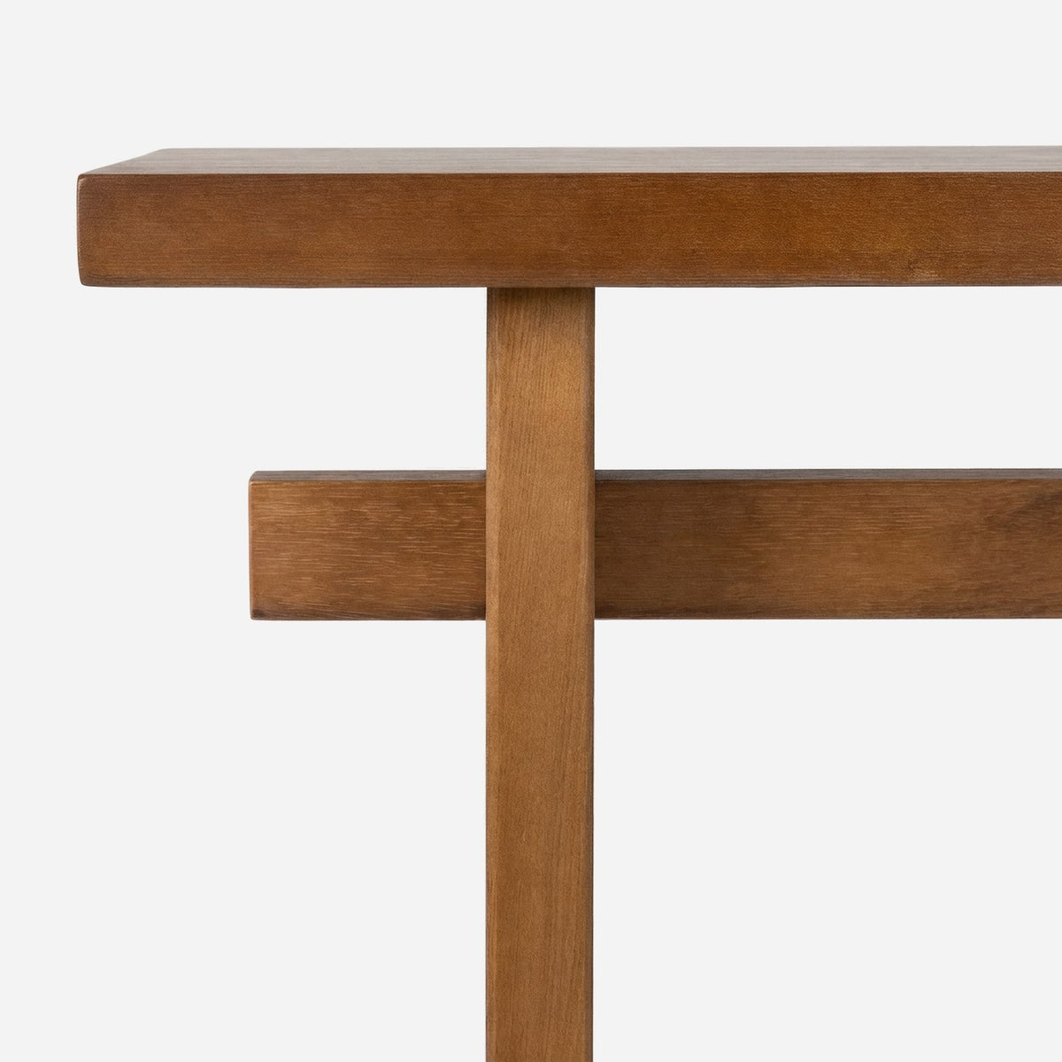 Crossbeam passing through the leg under the tabletop (close-up detail)