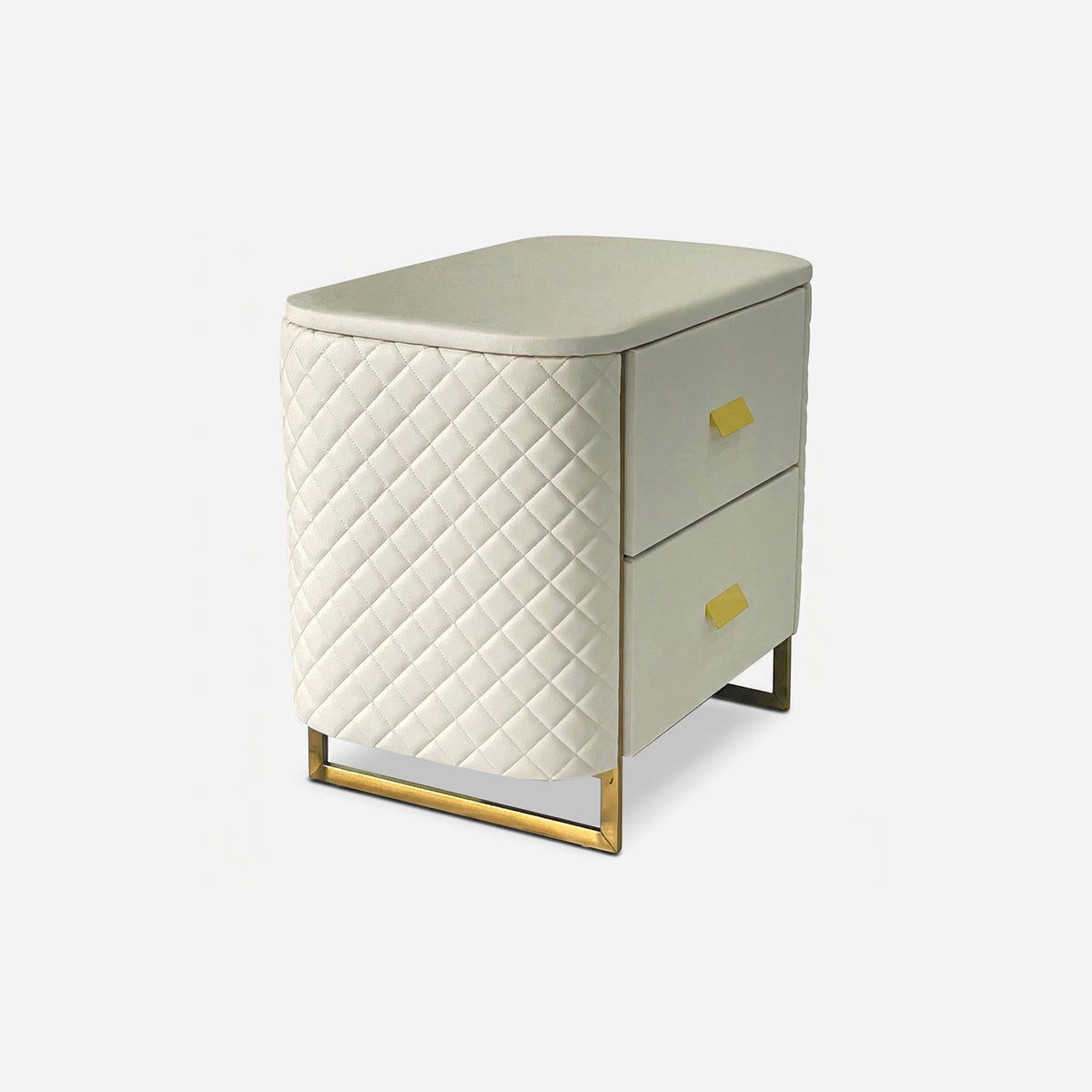 White and gold end table turned three-quarter to show its quilted side panel, two ivory drawers and gold sled base