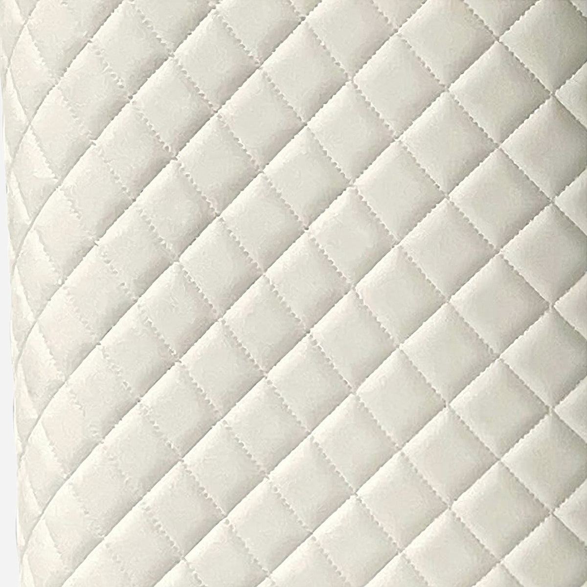 Diamond-stitch quilted side panel in ivory, close up