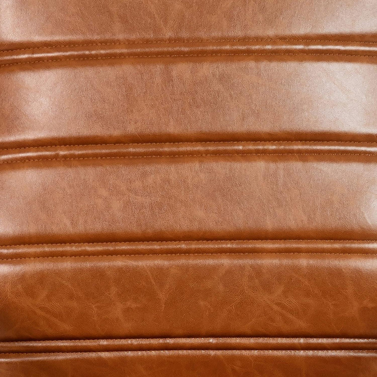 Close-up of the creased brown LeatherSoft backrest with horizontal stitching