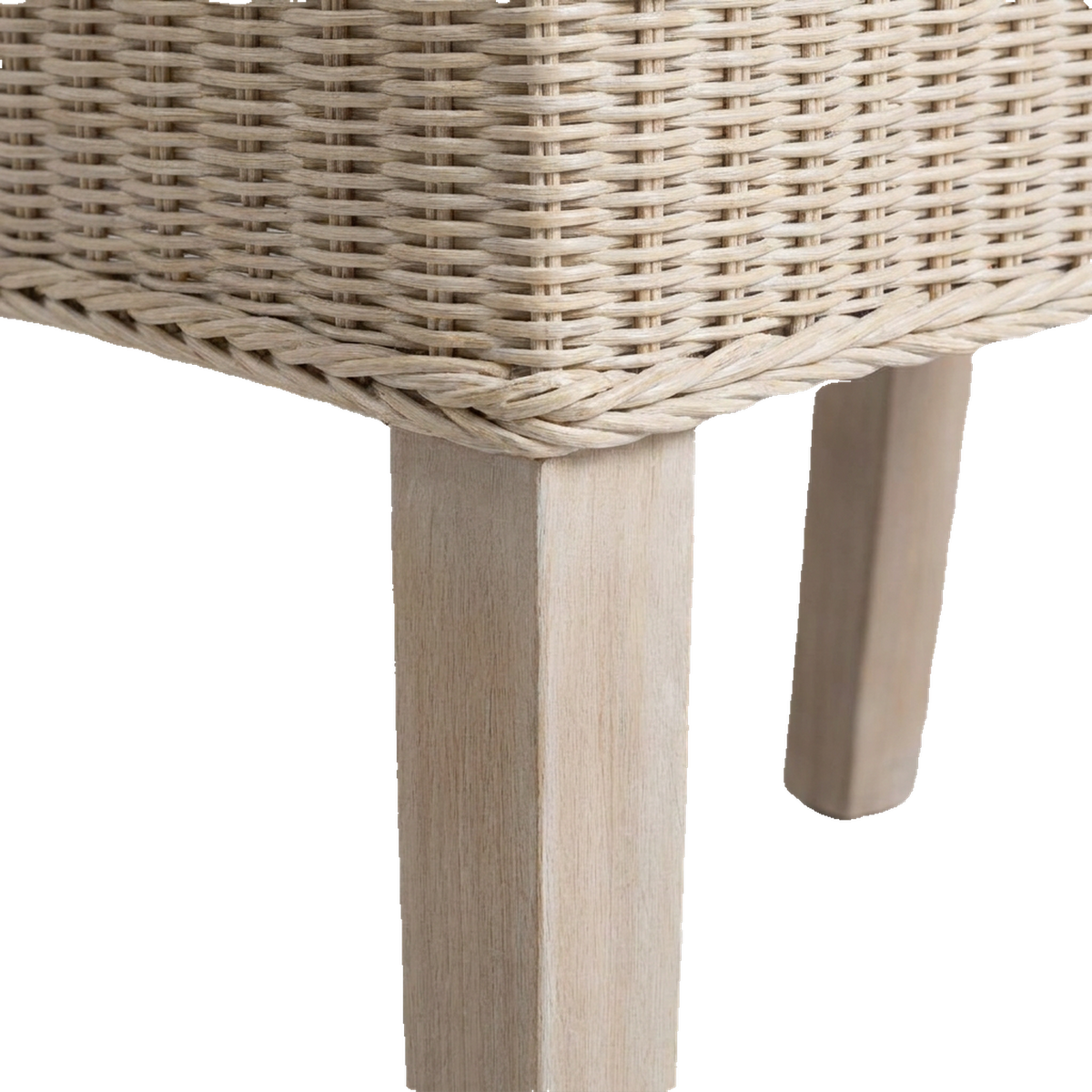 Braided rattan seat rim over square white washed hardwood legs (close-up detail)