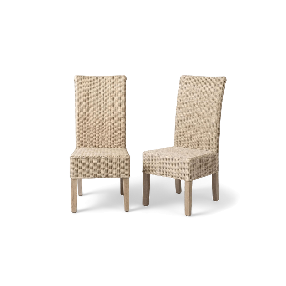 White washed rattan dining chair pair in a rotated three-quarter view (plain studio)