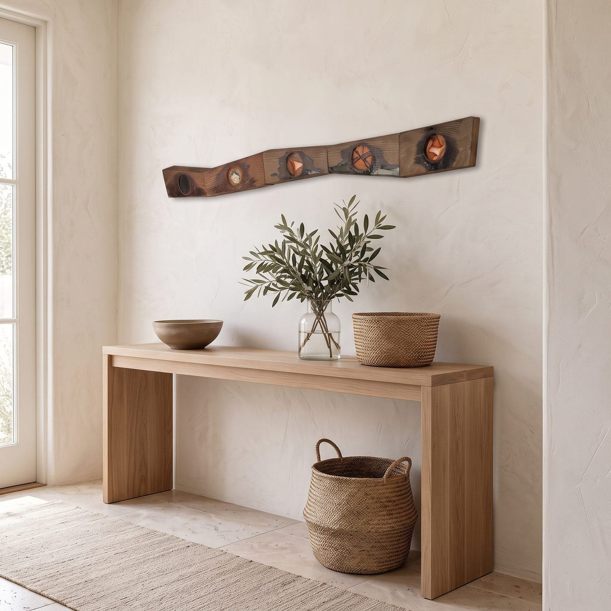 Three-quarter view of the zig zag strip above an oak console in a foyer