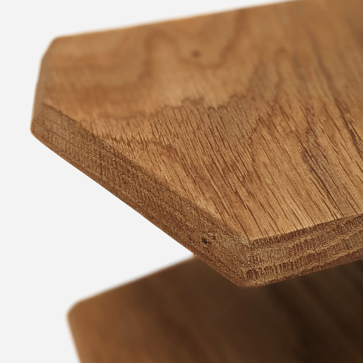 Bevelled corner of a fir tier showing layered end grain (close-up detail)