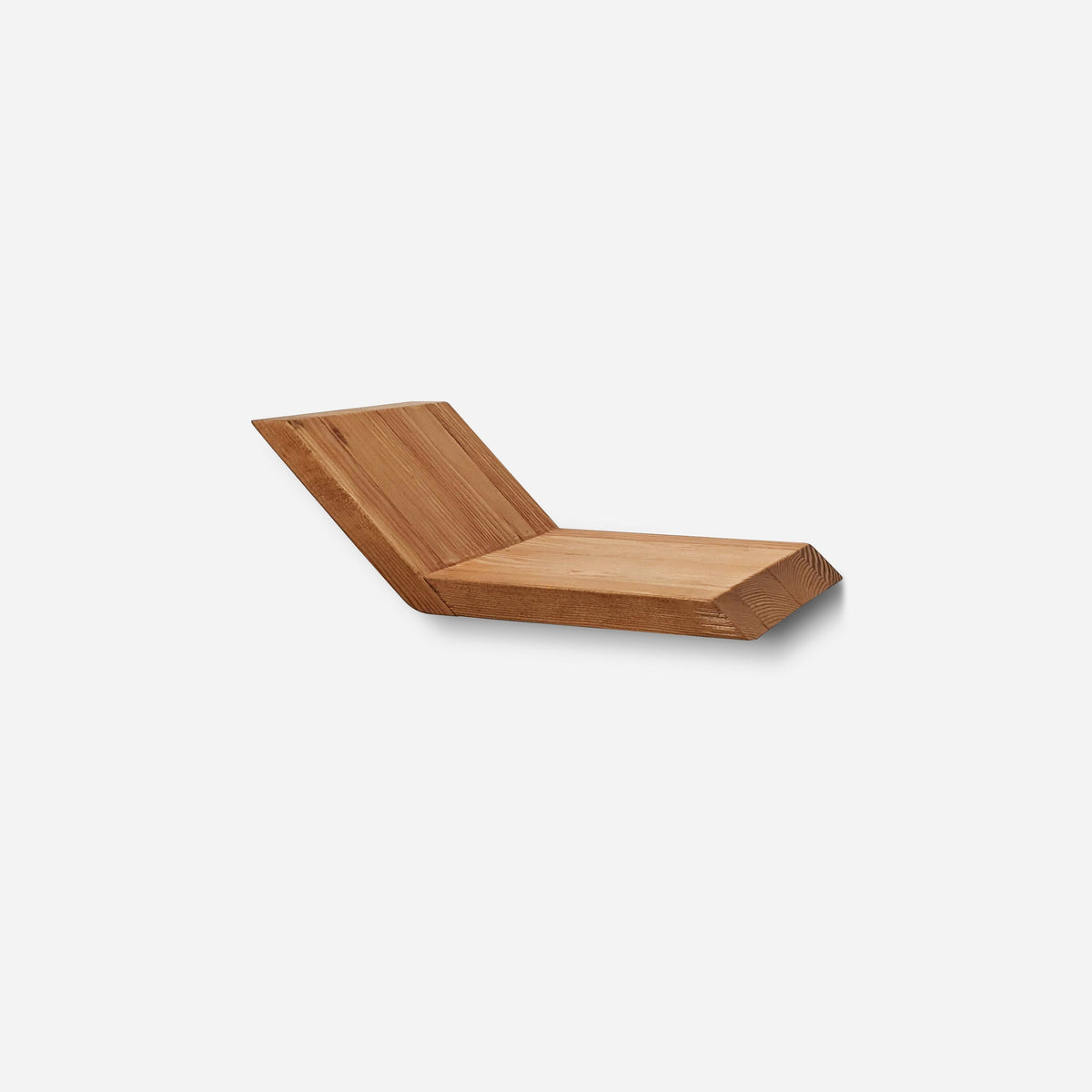 Single natural-finish reclaimed wood shelf hung on a wall